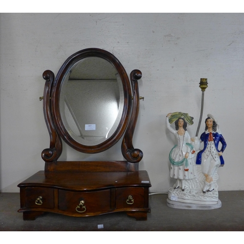 307 - A Victorian style mahogany toilet mirror and a Staffordshire flatback figure group converted to a la... 