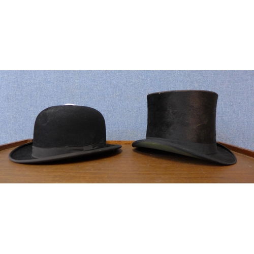 316 - A vintage gentleman's top hat and a bowler hat