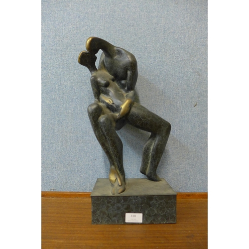 318 - A bronze abstract figure of two lovers