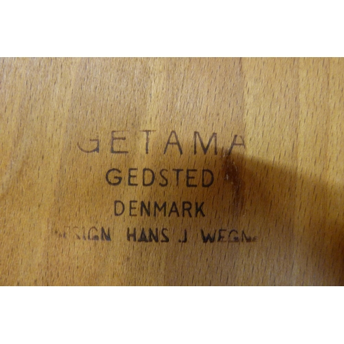 8 - A Danish Getama teak coffee table, designed by Hans Wegner