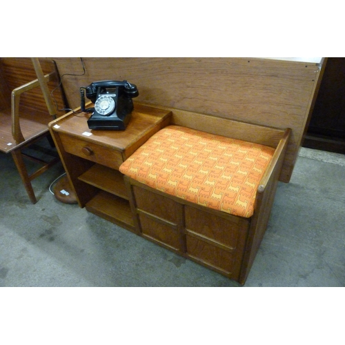 83 - A Nathan teak hall seat and a vintage telephone