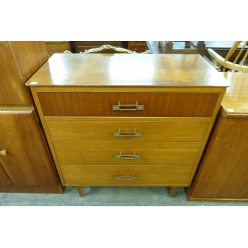 92 - A teak and oak chest of drawers