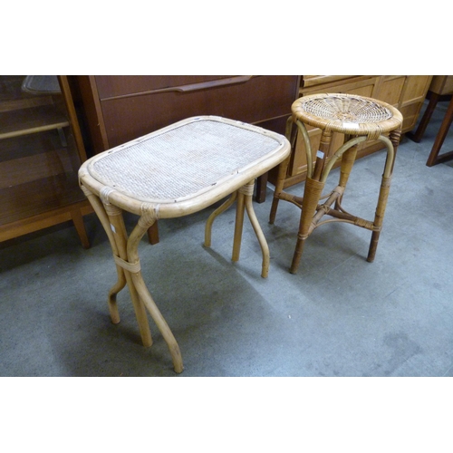 98 - An Italian bamboo and wicker stool, a table and baskets