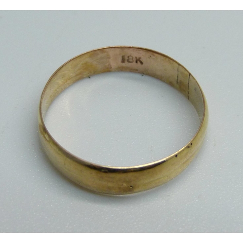 1007 - A yellow metal wedding band, 1.7g, O