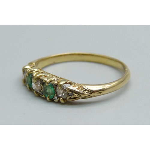 1015 - An 18ct gold, emerald and old cut diamond ring, 2.1g, K