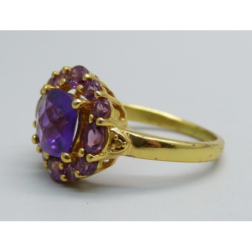 1016 - A silver gilt, checkerboard cut amethyst and pink tourmaline ring, S