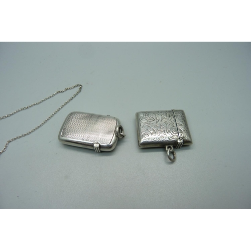 1067 - Two silver vesta cases and a 19th Century bottle label, 'raspberry'