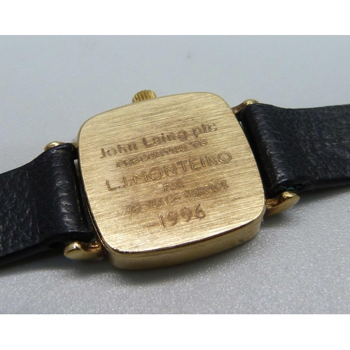 1071 - A lady'y 9ct gold cased Garrard wristwatch, cased back bears inscription