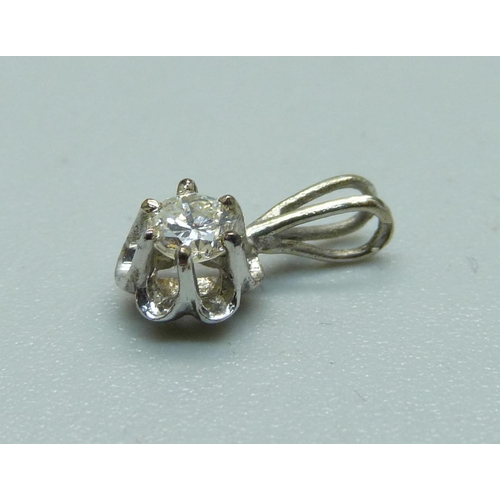 1074 - A white metal solitaire diamond pendant, 0.4g