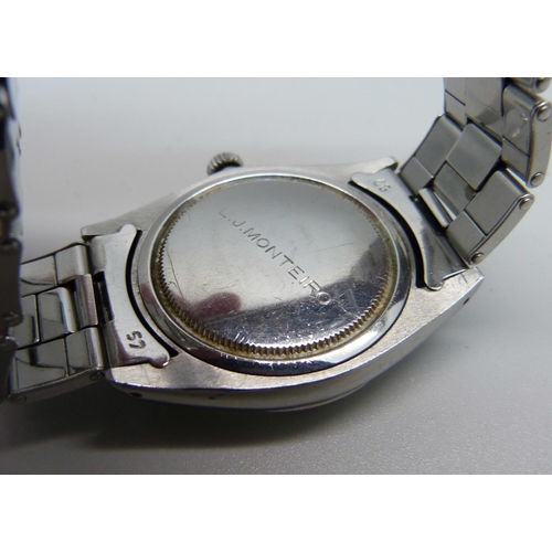 1086 - A late 1950's/early 1960's Rolex Oysterdate wristwatch, black dial with gold hour markers and hands,... 