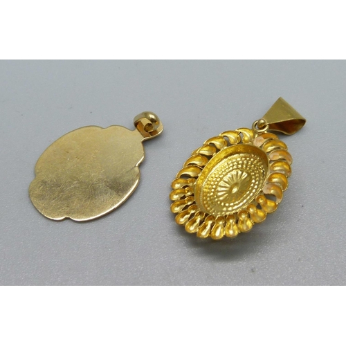 1089 - An 18ct gold pendant, marked 750, 2.5g, and a yellow metal pendant, 1.9g