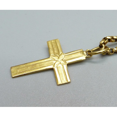 1091 - A yellow metal chain and a yellow metal cross pendant, test as high carat gold, 15.2g