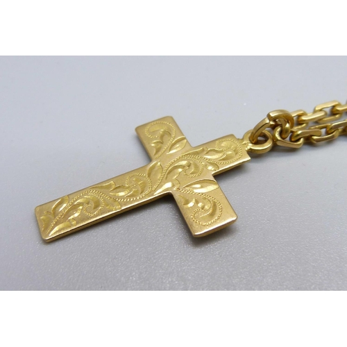 1096 - A yellow metal chain and a yellow metal cross pendant, test as high carat gold, 32.2g, chain 62cm