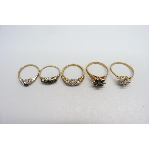 1101 - Five 9ct gold rings, 9.7g