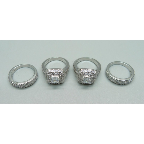 1148 - Four silver dress rings, marked S925, new, unused, K/L