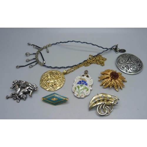 1166 - A 'Sphinx' Medusa head pendant and other named jewellery