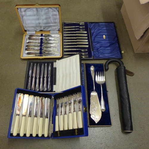 1173 - Cased flatware and a vintage umbrella in vinyl case **PLEASE NOTE THIS LOT IS NOT ELIGIBLE FOR POSTI... 