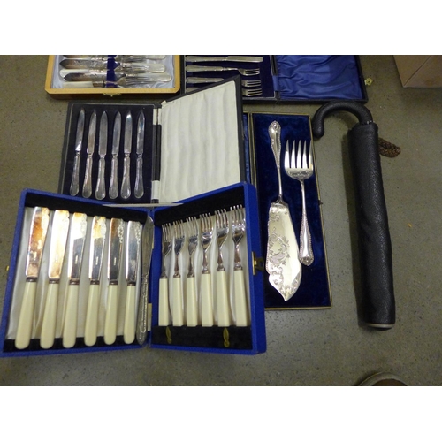 1173 - Cased flatware and a vintage umbrella in vinyl case **PLEASE NOTE THIS LOT IS NOT ELIGIBLE FOR POSTI... 