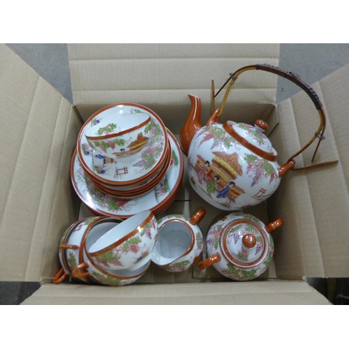 1203 - A Japanese Satsuma tea set **PLEASE NOTE THIS LOT IS NOT ELIGIBLE FOR POSTING AND PACKING**