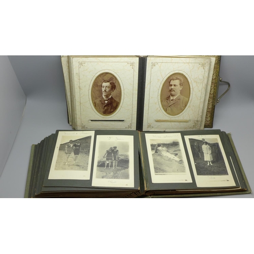 615 - An album of carte de visites and an album of early 20th Century photographs