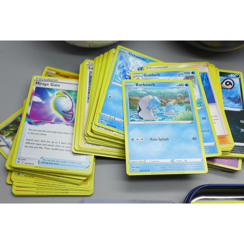 618 - Assorted Pokemon cards tins and cards