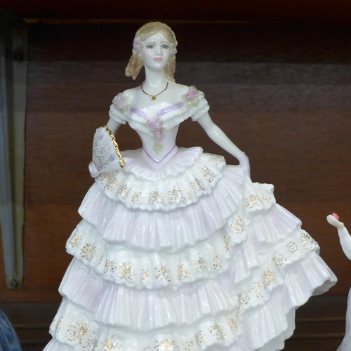 632 - A limited edition Royal Worcester figure, Belle of the Ball and two Royal Doulton figures