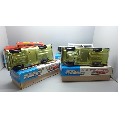 648 - Four Shudo friction powered emergency wagons; Rescue, Fire Dept., Ambulance and Police, boxed