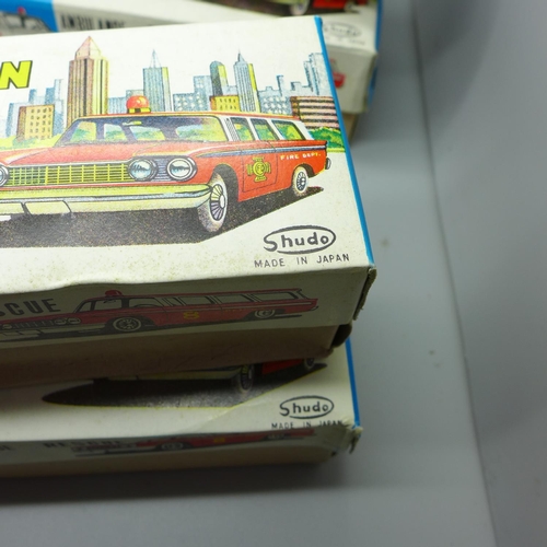 648 - Four Shudo friction powered emergency wagons; Rescue, Fire Dept., Ambulance and Police, boxed