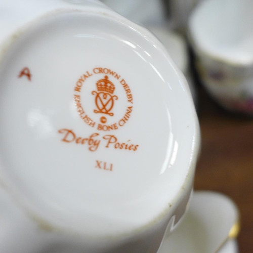 670 - A Royal Crown Derby Derby Posies tea set, ten setting lacking one tea plate