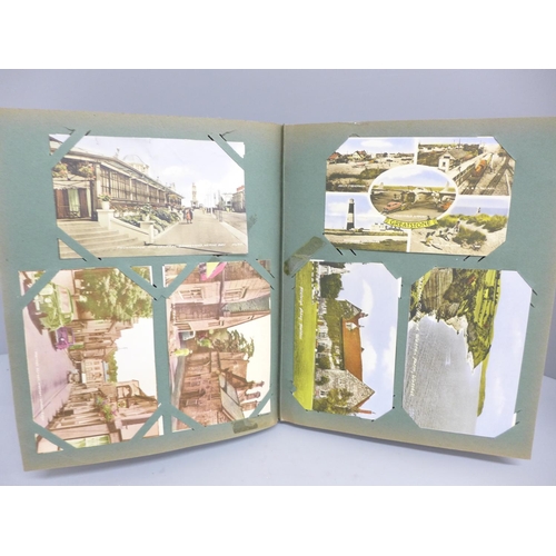 686 - A Victorian/Edwardian postcard album with approximately 300 later replica postcards, covering many t... 