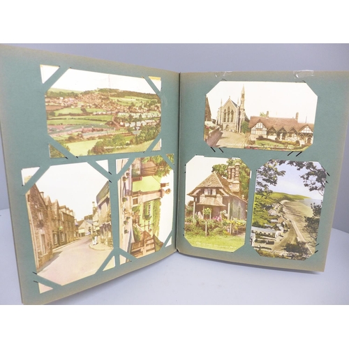 686 - A Victorian/Edwardian postcard album with approximately 300 later replica postcards, covering many t... 