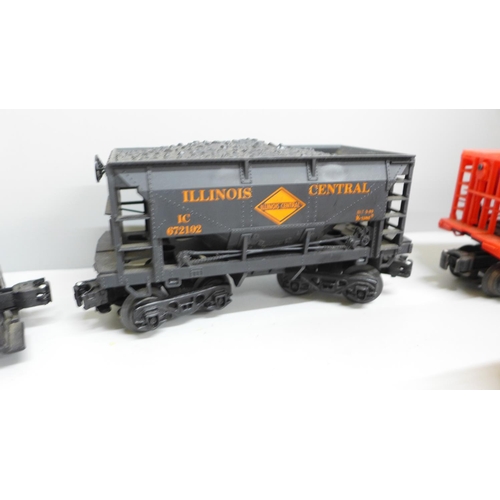 688 - A K-Line O gauge diesel locomotive and 5 hopper wagons