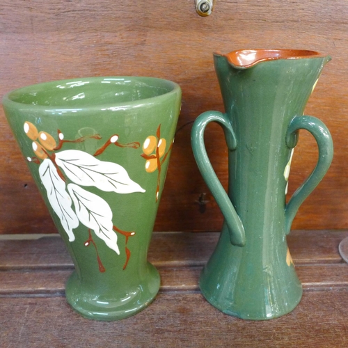 692 - A Brannan green glaze trumpet vase, an Aller Vale Arts and Crafts style vase, candlestick, two handl... 