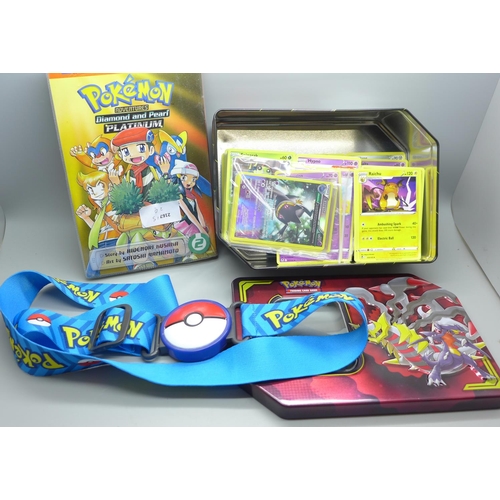 698 - Pokemon cards:- 400 Silver Tempest and ten Holo cards with Pokemon belt and book