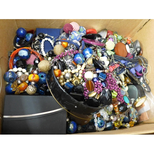 701 - A box of costume jewellery