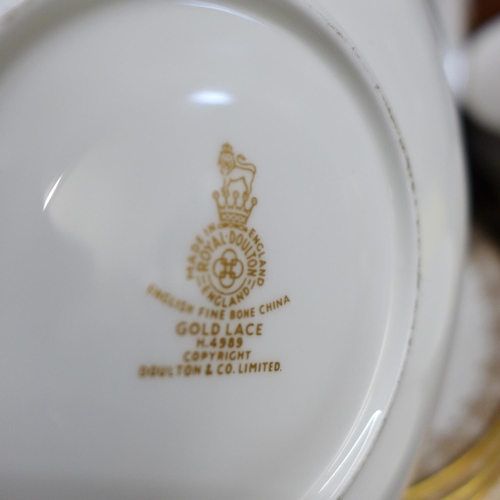 702 - A Royal Doulton Gold Lace tea set