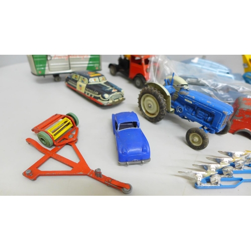 711 - Playworn die-cast model vehicles and some clockwork toys
