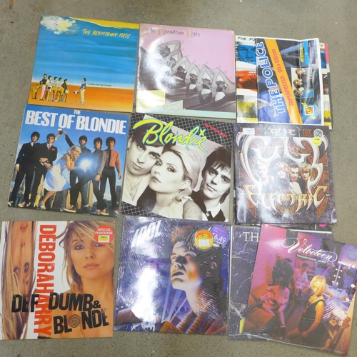 712 - A collection of 1980s LP records including Blondie, The Police, etc. (17)