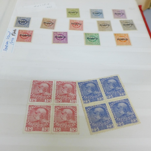 714 - Two stamp albums, one partially filled