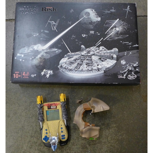 721 - A Star Wars Risk game and two Tiger Star Wars electronic games