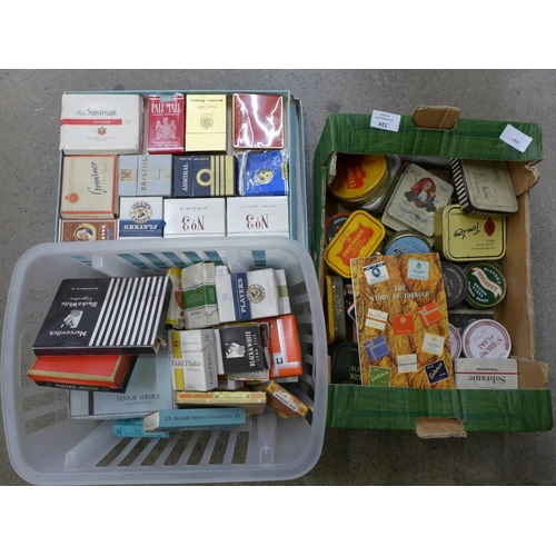 724 - A quantity of tobacco tins and vintage cigarette packets
