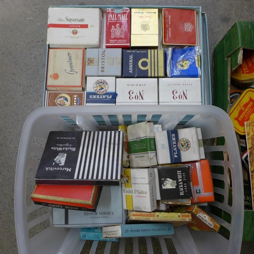 724 - A quantity of tobacco tins and vintage cigarette packets
