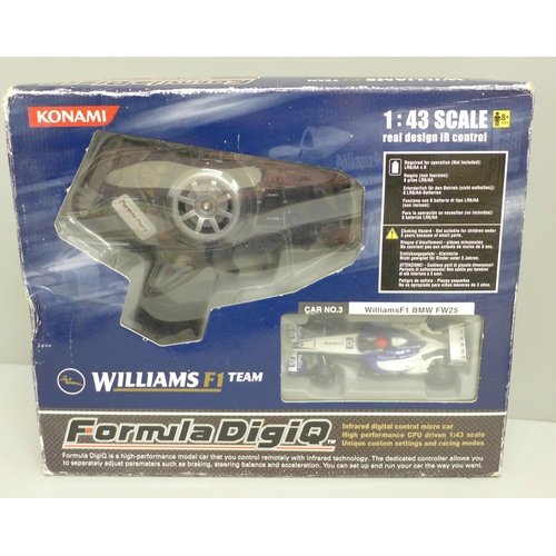 755 - A Konami 1/43 scale Williams F1 BMW FW25 car, boxed