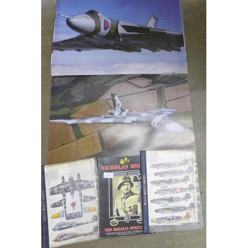 758 - Two folders of German WWII aircraft information sheets, a Nicholas Morigi Anniversary catalogue and ... 