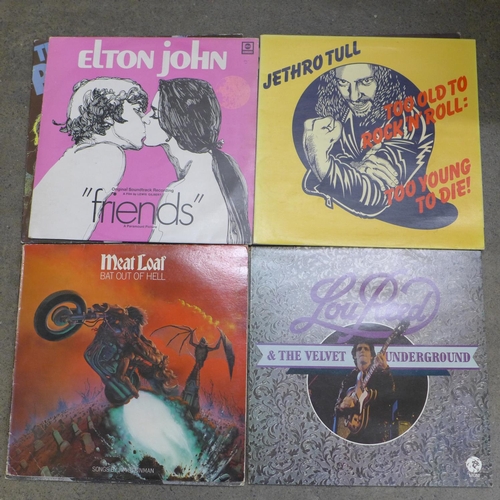 769 - A collection of twelve 1970's rock LP records including Police, Neil Young, Lou Reed, Jethro Tull, e... 