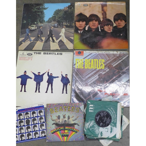 775 - Seven original Beatles LP records and fourteen 7