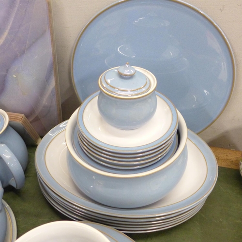 810 - A collection of Denby Colonial Blue dinnerwares, comprising cake plate, table mats and coasters, six... 