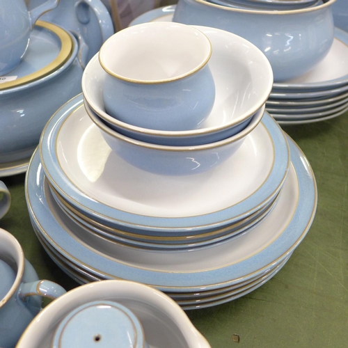 810 - A collection of Denby Colonial Blue dinnerwares, comprising cake plate, table mats and coasters, six... 