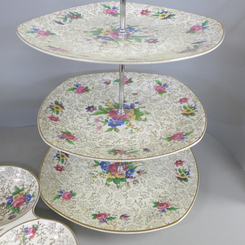 823 - Two Midwinter Stylecraft three tier cake stands and a nut dish