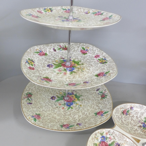 823 - Two Midwinter Stylecraft three tier cake stands and a nut dish